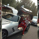 Illustration for article titled Here’s A Chinese Woman With Frowny Pants Getting Out Of An SLS AMG